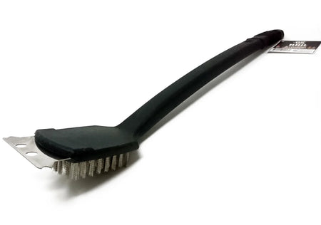 A black plastic and metal wire brush with a scraper-like metal edge, photographed on a plain white background. A small product tag is attached near the handle end.