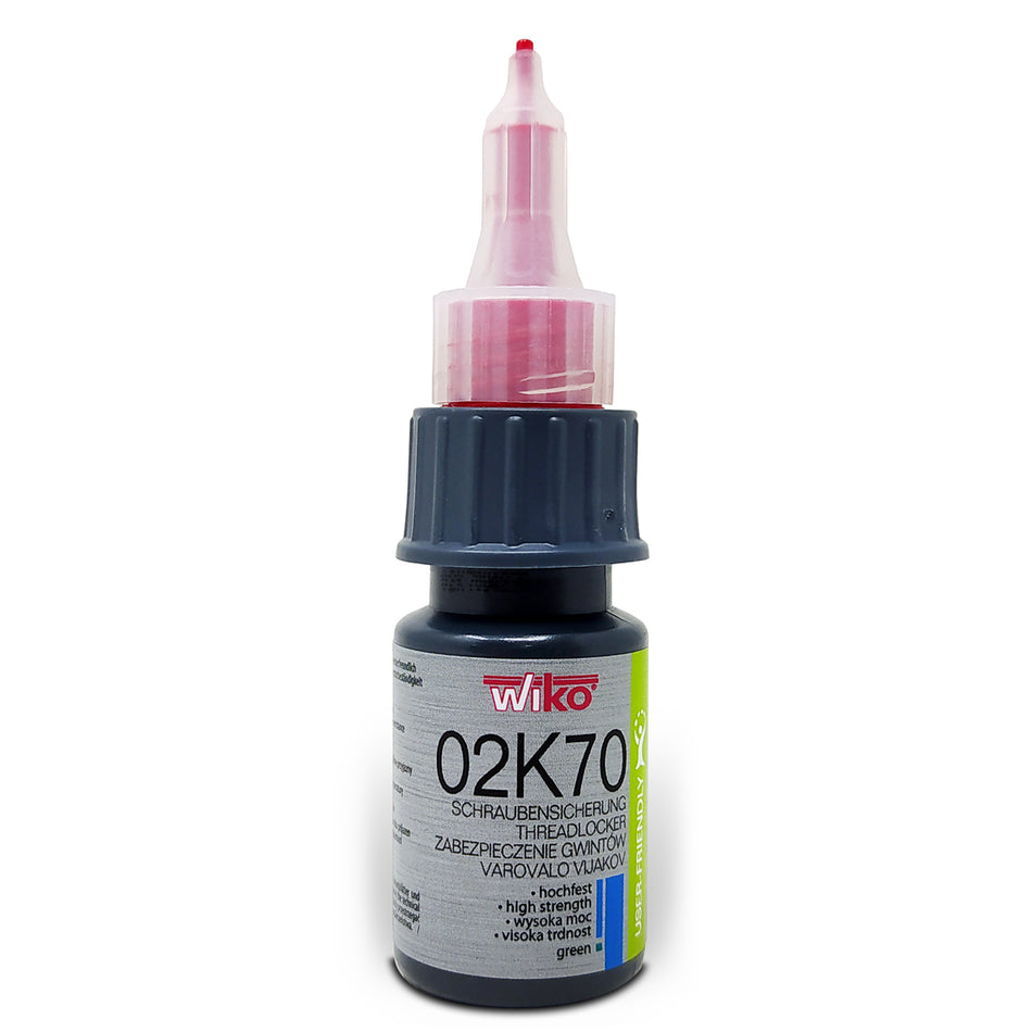 A bottle of Wiko threadlocker, model 02K70, featuring a dark gray ribbed cap, a black bottle body, and a pink applicator tip, shown on a white background.