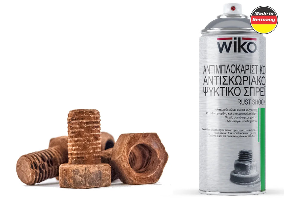 A can of Wiko Rust-Shield anti-corrosion spray next to several rusty brown metal bolts and nuts on a white background, with a 'Made in Germany' badge in the top right corner.