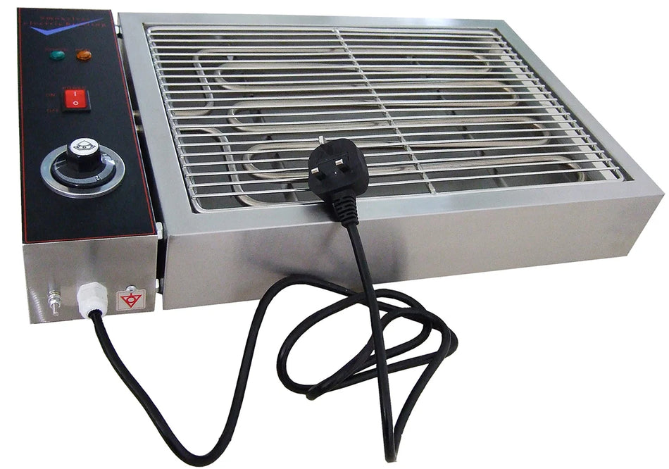 A commercial electric hot dog grill with a stainless steel griddle, a black control panel on the left with a dial and push-button, and a black power cord with a UK three-pin plug, shown on a white background.