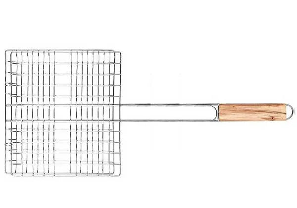 A metal wire grilling basket with a long handle and a light brown wooden end, shown against a plain white background.